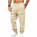 Men's khaki fleece-lined cargo sweatpants with drawstring waist and flap pockets. - Apricot