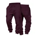 Detailed view of men's waffle cargo joggers with drawstring waist and pockets - S / Black