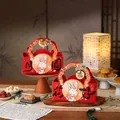 Detail of red Mid-Autumn gift boxes with rabbit theme and decorative handles - Blooming Full Moon Style / Including Tag and Cord