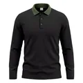 Detailed view of the textured black Polo shirt with a green ribbed collar design - S / Tops / Black