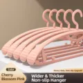 Pink wide thick non-slip clothes hangers for home use, durable plastic coat rack storage. - Extra Thick Wide Shoulder Style / 10 Pieces Pack / Peach Pink