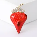 Detailed view of a cute red enamel strawberry brooch with sparkling crystal leaf - Strawberry Style / Strawberry Red