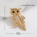 Broche de búho vintage dorado con brillantes cristales de strass y ojos de cuentas negras - Dorado Blanco