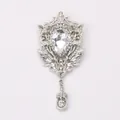 Exquisite vintage silver-tone court style brooch with clear rhinestones and crystal - White