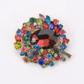 Vintage alloy brooch with multi-color crystals and large red stone center - Burgundy