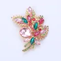 Elegant crystal flower bouquet brooch with vibrant multicolored stones in gold finish - Gold Base Pink