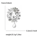 Eleganter Silber-Legierungs-Brosche mit klaren Glassteinen und tropfenförmigem Anhänger - 7.6x5.3cm / Weiß
