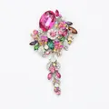 Vintage multi-color rhinestone brooch with elegant pink crystal and tassel drop detail - Rose Red