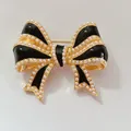Elegant vintage style black enamel bow brooch with tiny pearl accents and gold plating - Style B (Black Bowknot)