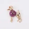 Elegant vintage poodle brooch featuring purple faux glass body and sparkly rhinestone details. - Poodle Style (C4-4-8056) / Gold Purple