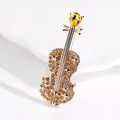 Exquisite golden violin brooch adorned with amber crystals and pear-shaped yellow stone - Violin / Gold