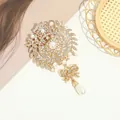 Luxury teardrop brooch with sparkling rhinestones and pearls in gold alloy finish - Gold Floral Wreath Bow Water Drop Pearl Brooch (C2-5-9173)