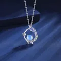 Dreamy silver fishtail necklace with blue gemstone and purple enamel detail for women - Mermaid Tail Style