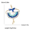 Elegant gold-tone ballet dancer brooch with blue enamel dress and sparkling rhinestones - 5.8x4.2cm / Blue