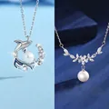 Elegante kettingen met walvis en bloem parel hangers en fonkelende kristallen steentjes - Walvisval + Bloementak Parel (Eenvoudige Verpakking)