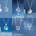 Collectie hemelse zilveren kettingen met sterren, maan en iriserende blauwe stenen - Zwevend + Melkweg + Dromerig + Pluto + Sterren Rondom + Droomjager / Eenvoudige Verpakking