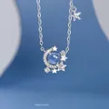 Elegante zilverkleurige ster- en maanhalsketting met blauwe hemelbolhanger voor dames - Geschenkdoos / Cluster Instelling