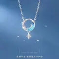 Elegante zilveren ster en maan hanger ketting met blauw kristal en sprankelende zirkonia - Geschenkdoos / Achtervolg de Sterrenmaan