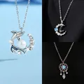 Elegante zilveren walvisketting met een centrale parel en sprankelende zirkoonstenen - Walvisval, Vlinder Maan & Dromenvanger Stijl (Geschenkdoos)