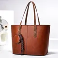 Minimalist brown large faux leather tote bag with round coin purse charm and ribbon - Earthy Yellow