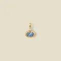 Gedetailleerd macrozicht van een 18K vergulde hanger met een ovale blauwe edelsteen. - Lichtblauwe Ovale Edelsteen / Maart Stijl Goud