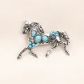 Vintage silver alloy horse brooch with detailed imitation turquoise stones for coats - Silver