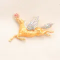 Elegant vintage gold winged Pegasus brooch with iridescent rhinestones and a red rose accent - Yellow