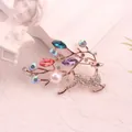 Detailed view of a vintage rhinestone reindeer brooch with colorful gems and pearl - Multicolor Gemstone Deer (O2-3-5143) / Rose Gold