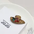 Close-up detail of an elegant alloy sun hat brooch featuring vibrant colorful rhinestones - Multi-Color Rhinestone Hat Brooch