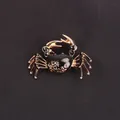 Macro detail showing the intricate gold pattern and black enamel finish on this crab brooch - Black Enamel Gold Crab
