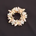 Detailed view of elegant golden wreath brooch featuring sparkling crystals and flowers - Butterfly Floral Ring Style (N5-2-4494) / Gold