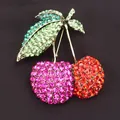 Macro detail of a sparkling rhinestone cherry brooch with vivid red and purple gems. - Full Rhinestone Colorful Cherry Style (H1-3-2037)