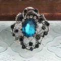 Luxe vintage zilveren broche met een grote blauwe kristal en fonkelende strass-steentjes - Hemelblauwe Ovale Stijl