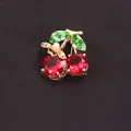 Elegant rhinestone cherry brooch with vibrant red gems and green enamel leaves - Bee Cherry Style (A7-1-5503)