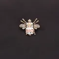 Elegant vintage enamel bee brooch with sparkling rhinestones on black textured background - Pink and Grey Patchwork Enamel Style (K7-6-3078)