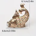 Elegant gold-toned goldfish brooch with opals, pearl, and rhinestones, sized 6.6x6.1cm - Iridescent Gemstone Fish (M3-6-1781)