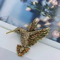 Elegante strass kolibrie broche met vintage gouden afwerking voor damesmode accessoires. - Champagne Strass Kolibri / Champagne Antiekgoud