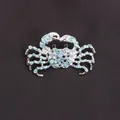 Detailed silver marine crab brooch pin featuring sparkling blue and clear rhinestones - Light Blue Rhinestone Silver Crab