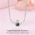Elegante zilveren engelenvleugel projectie ketting met 'Ik hou van je' steen in 100 talen - Engelenvleugel Ketting / Eenvoudige Verpakking