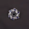 Elegant circular wreath brooch pin featuring deep blue crystals in a silver-tone setting - Silver Blue Rhinestone Wreath