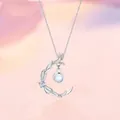 Elegant silver crescent moon pendant necklace with leaf motifs and iridescent moonstone - Three Lifetimes of Love (Crescent Moon)