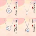 Set van 4 elegante zilveren kettingen met maansteen ginkgo, vlinder, vogel en planeet - 4-delige set 4