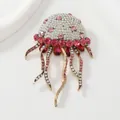 Sparkling jellyfish brooch pin with pink and white rhinestones on white background. - Pink White Gold Red Jellyfish (O9-6-5809)