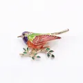 Exquisite colorful bird brooch featuring vibrant enamel and crystal accents on a branch - Red Green Wing Bird (J4-5-1069)