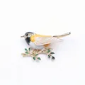 Exquisite vintage enamel bird brooch with sparkling rhinestones on a golden leafy branch - Black White Yellow Bird (J4-5-1068)