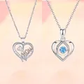 Halsketting met hartvorm en blauwe dansende steen in zilveren finish - Geschenkdoos / Moederliefde en Hartslag Blauwe Set