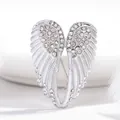 Elegant silver-toned angel wings brooch pin with sparkly white crystal rhinestones - Silver