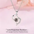 Close-up view of heart-shaped projection necklace with clear micro-engraving detail stone. - Heart Style (Simple Packaging)