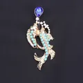 Elegant goldfish brooch with blue crystal and turquoise beads shown on black background - Sky Blue Beaded Koi (N4-6-4458)