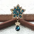 Stijlvolle vintage broche met blauwe kristallen en heldere strass voor damesmode - Diepblauwe Waterdruppel Bloem Stijl